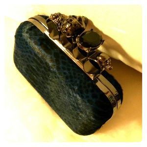 Zebra/cheetah faux fur knuckle clutch